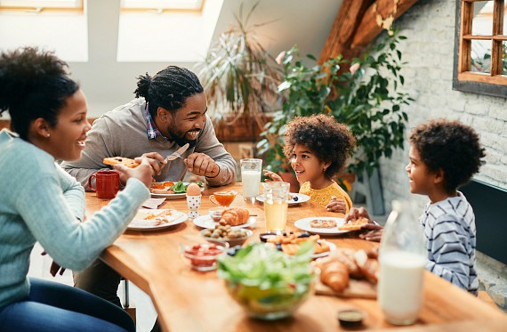 Family eating breakfast before the school day starts.